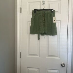 Women’s shorts size medium with a drawstring color green